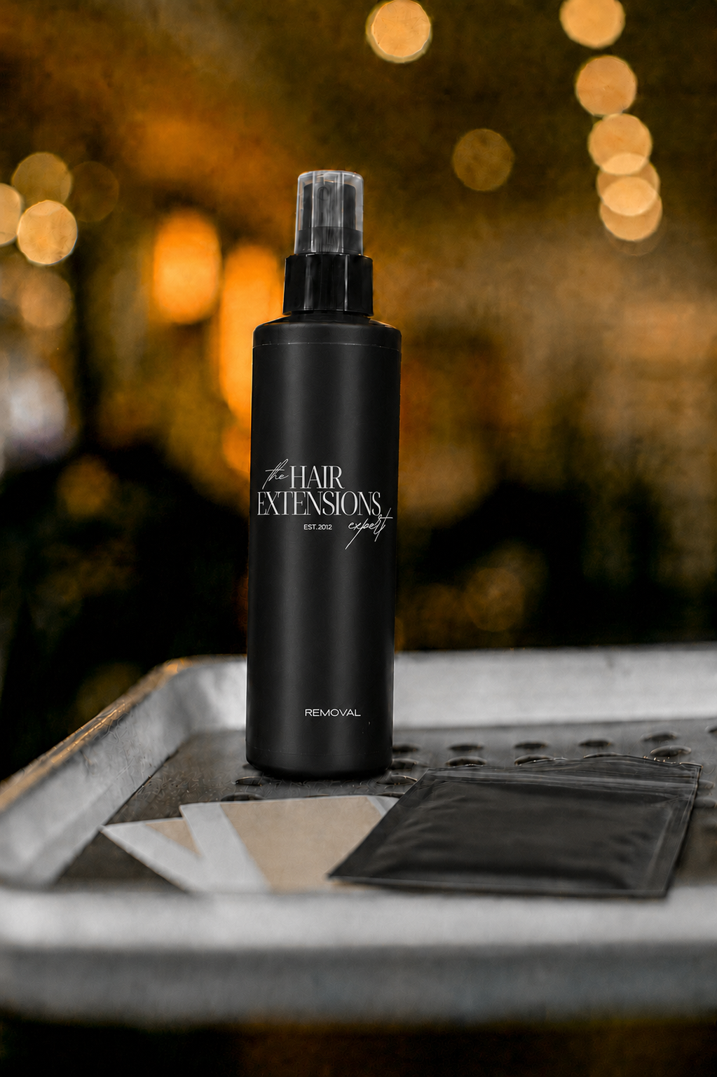 Tape extension remover with The Hair Extensions Expert logo
